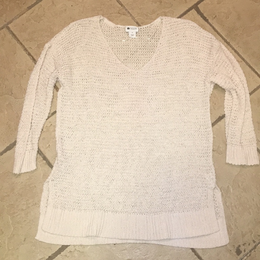 Light colored sweater